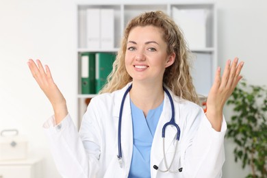 Photo of Pediatrician having video call with patient, view from camera