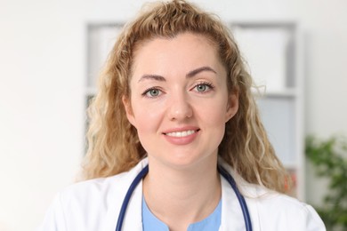 Photo of Pediatrician having video call with patient, view from camera