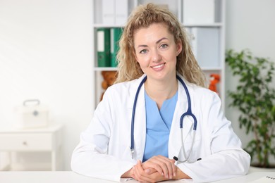 Photo of Pediatrician having video call with patient, view from camera