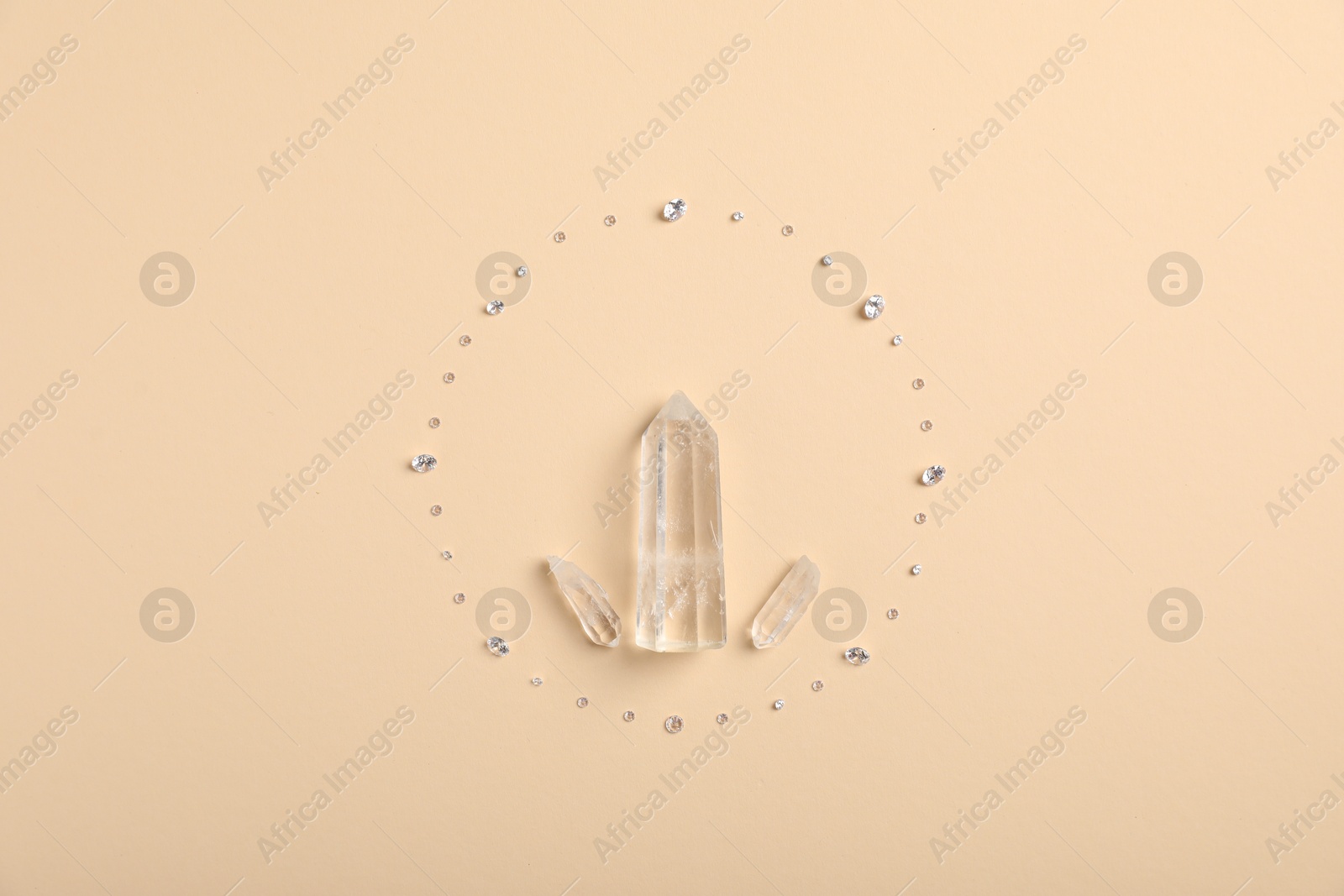 Different gemstones on beige background, flat lay Photo of Different gemstones on beige background, flat lay