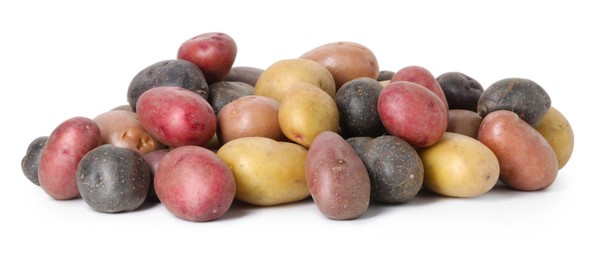 Photo of Different types of potatoes isolated on white