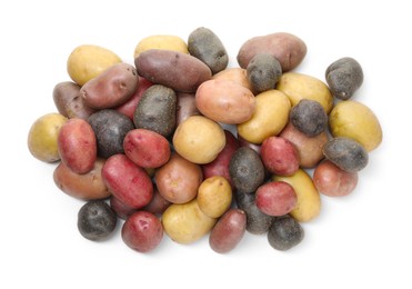 Photo of Different types of potatoes isolated on white, top view