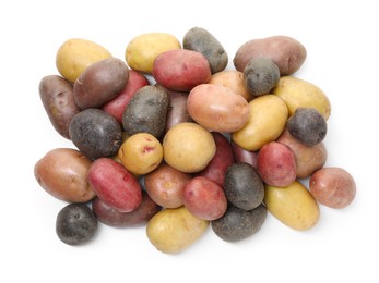 Photo of Different types of potatoes isolated on white, top view