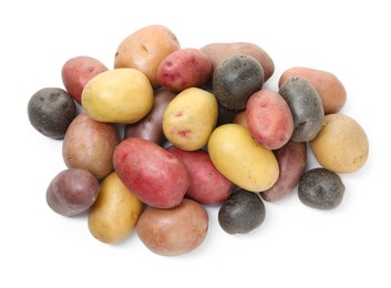 Photo of Different types of potatoes isolated on white, top view