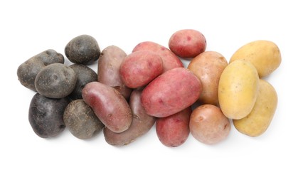Photo of Different types of potatoes isolated on white, top view