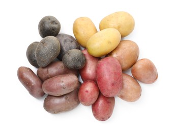 Photo of Different types of potatoes isolated on white, top view