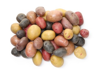 Photo of Different types of potatoes isolated on white, top view