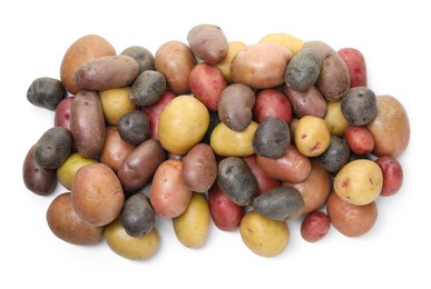 Photo of Different types of potatoes isolated on white, top view