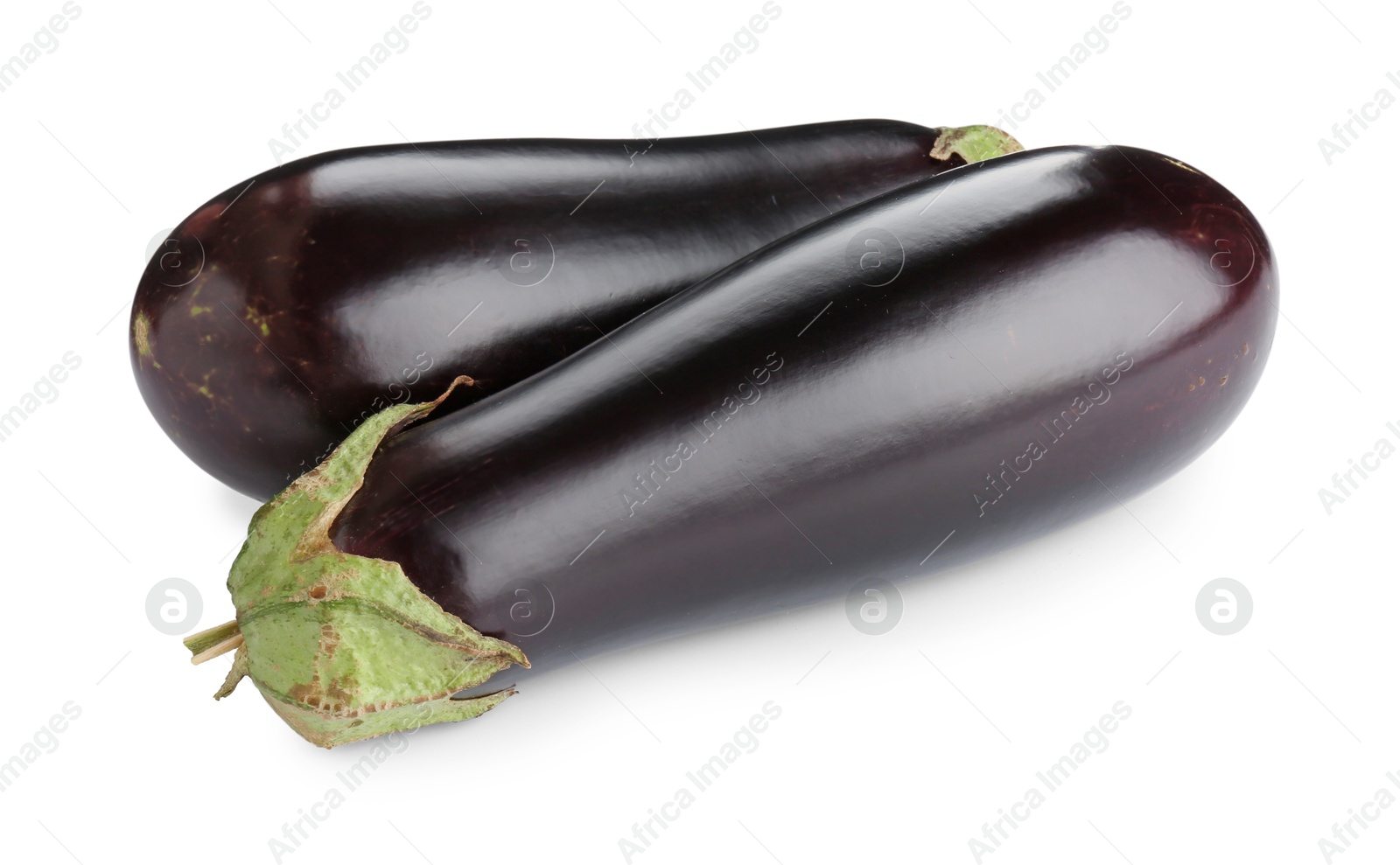 Photo of Fresh raw ripe eggplants isolated on white