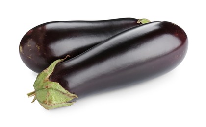 Photo of Fresh raw ripe eggplants isolated on white