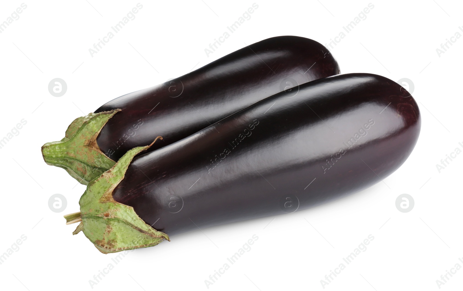 Photo of Fresh raw ripe eggplants isolated on white