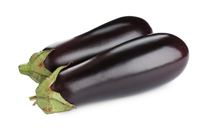 Photo of Fresh raw ripe eggplants isolated on white