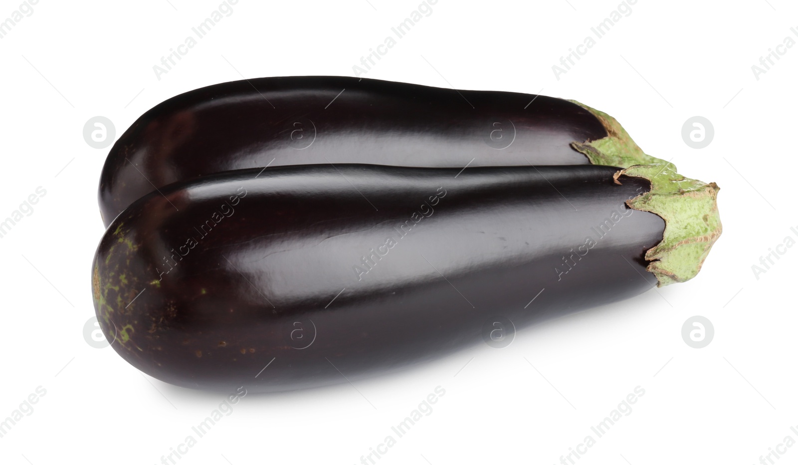 Photo of Fresh raw ripe eggplants isolated on white