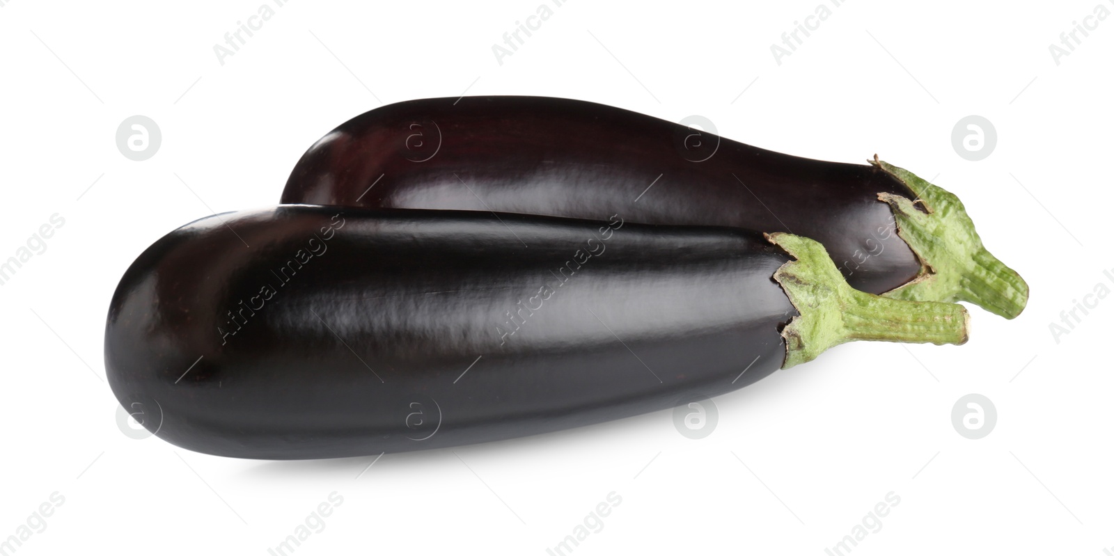Photo of Fresh raw ripe eggplants isolated on white