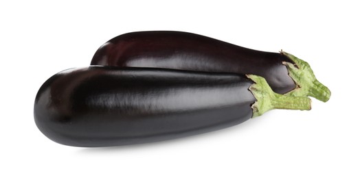Photo of Fresh raw ripe eggplants isolated on white