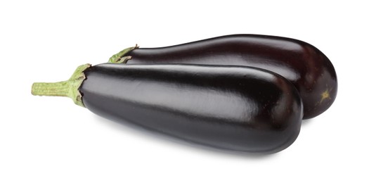 Photo of Fresh raw ripe eggplants isolated on white