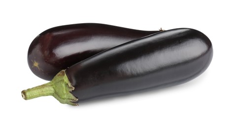 Photo of Fresh raw ripe eggplants isolated on white
