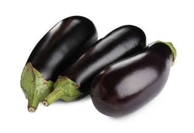 Photo of Fresh raw ripe eggplants isolated on white