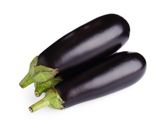 Photo of Fresh raw ripe eggplants isolated on white