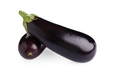 Photo of Fresh raw ripe eggplants isolated on white