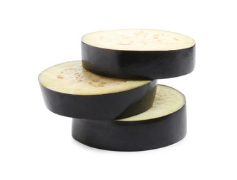 Photo of Slices of raw eggplant isolated on white