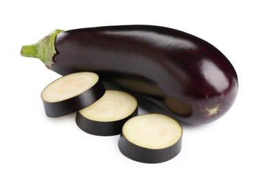 Photo of Whole and cut fresh eggplants isolated on white