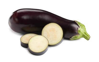Photo of Whole and cut fresh eggplants isolated on white