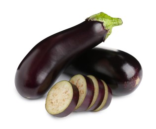 Photo of Whole and cut fresh eggplants isolated on white