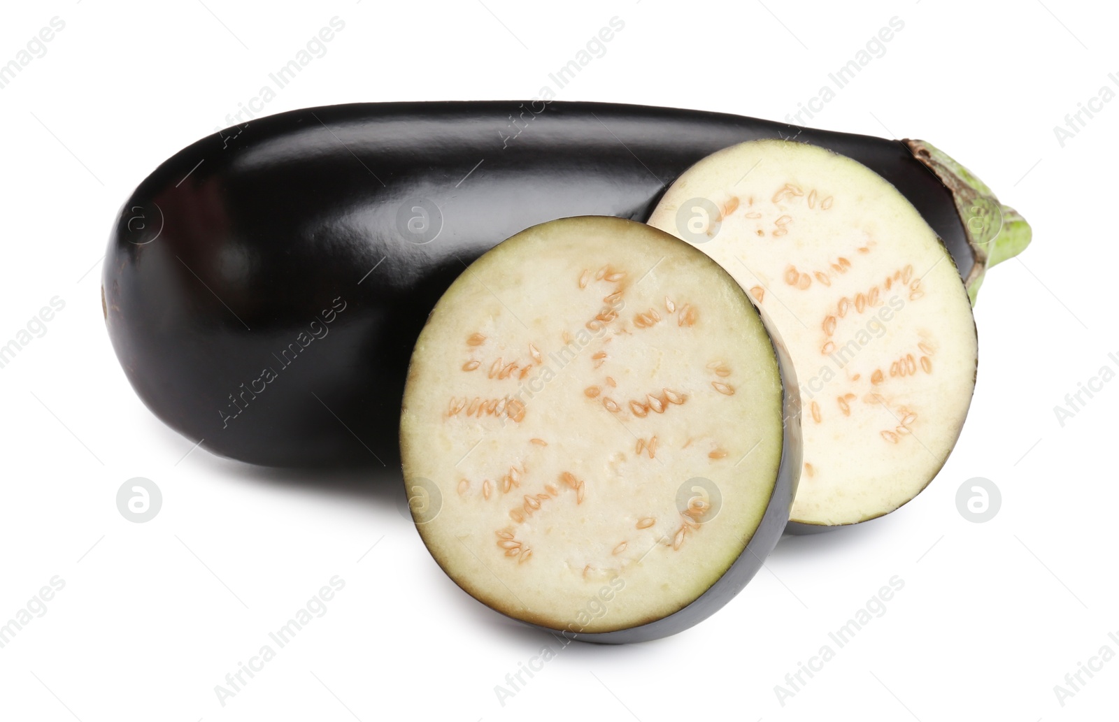 Photo of Whole and cut fresh eggplants isolated on white