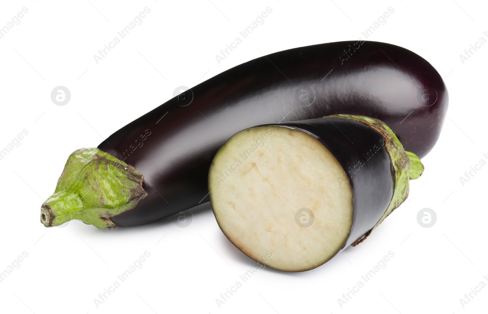 Photo of Whole and cut fresh eggplants isolated on white