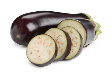 Photo of Whole and cut fresh eggplants isolated on white