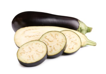 Photo of Whole and cut fresh eggplants isolated on white