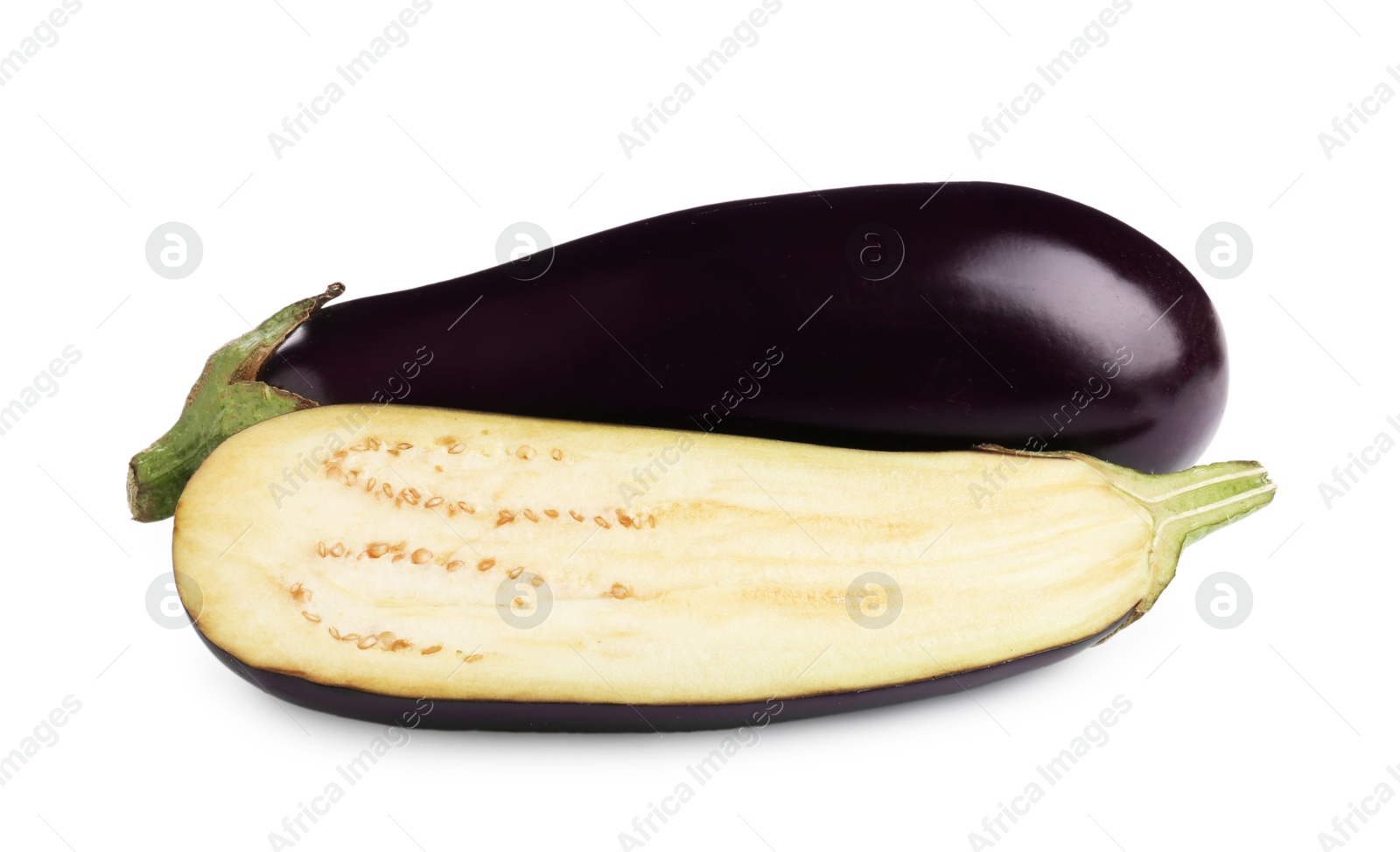 Whole and cut fresh eggplants isolated on white Photo of Whole and cut fresh eggplants isolated on white