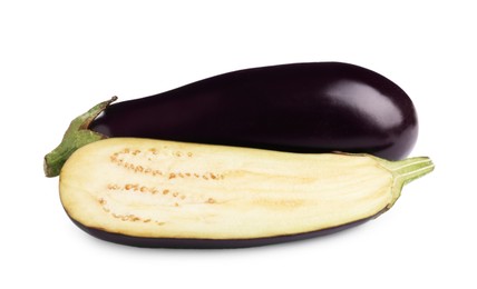 Photo of Whole and cut fresh eggplants isolated on white