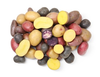 Photo of Different types of potatoes isolated on white, top view