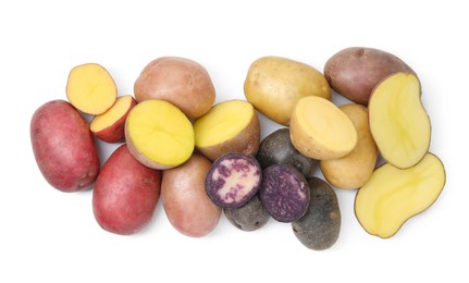 Photo of Different types of potatoes isolated on white, top view
