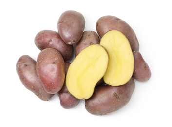 Photo of Whole and cut fresh potatoes isolated on white, top view