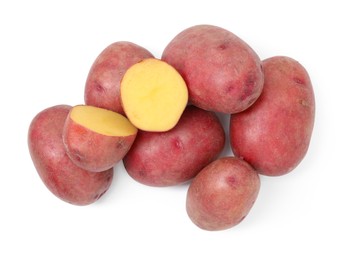 Photo of Whole and cut fresh red potatoes isolated on white, top view