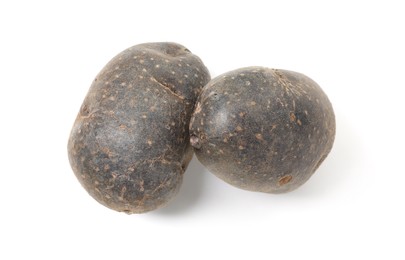 Photo of Fresh purple potatoes isolated on white, top view