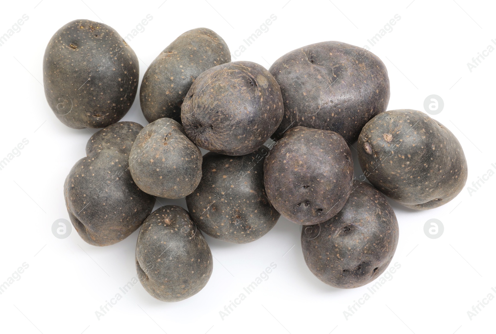 Photo of Fresh purple potatoes isolated on white, top view