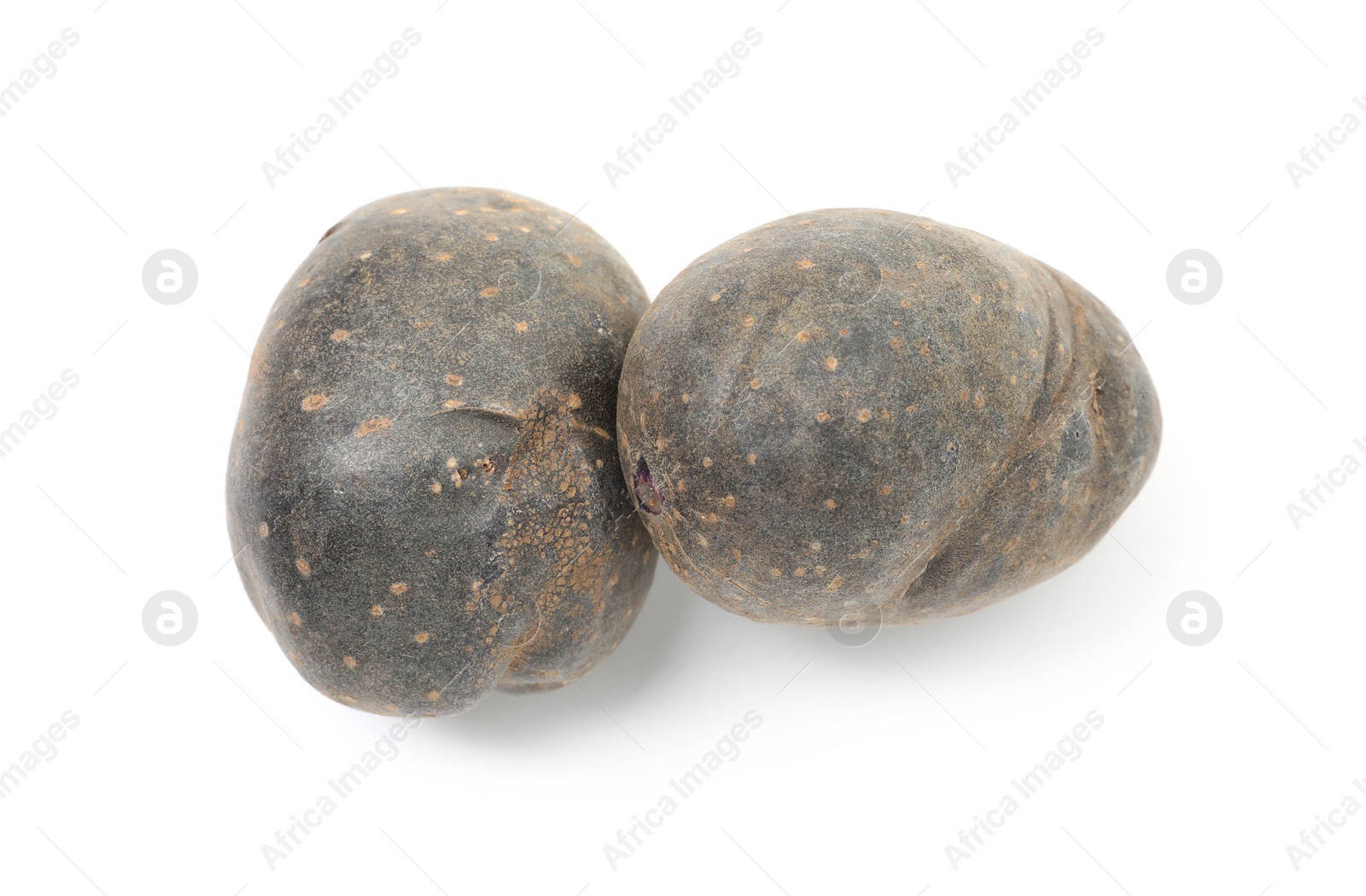 Photo of Fresh purple potatoes isolated on white, top view