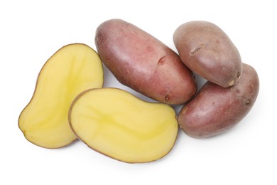 Photo of Whole and cut fresh red potatoes isolated on white, top view