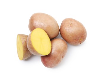 Photo of Whole and cut fresh potatoes isolated on white, top view