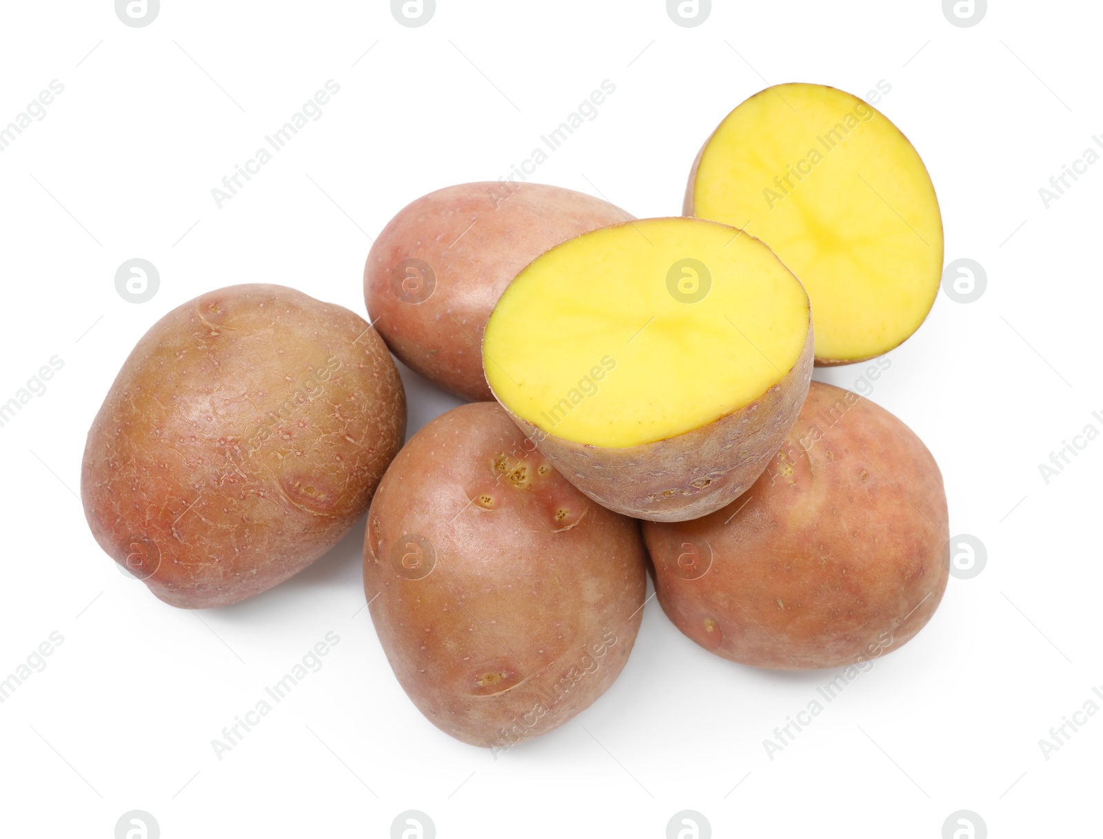 Photo of Whole and cut fresh potatoes isolated on white, top view