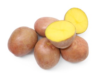 Photo of Whole and cut fresh potatoes isolated on white, top view