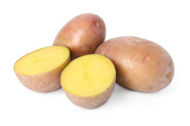 Photo of Whole and cut fresh potatoes isolated on white