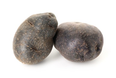 Photo of Fresh ripe purple potatoes isolated on white