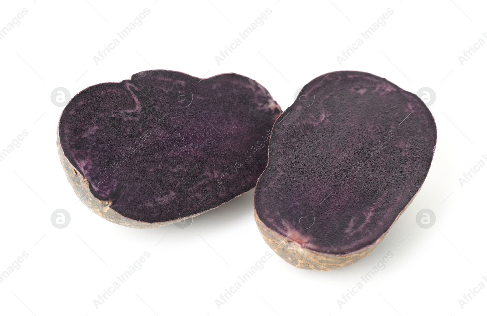 Photo of Cut fresh ripe purple potato isolated on white