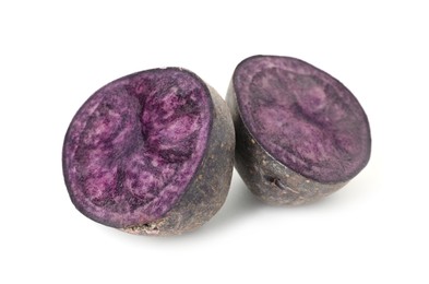 Photo of Cut fresh ripe purple potato isolated on white