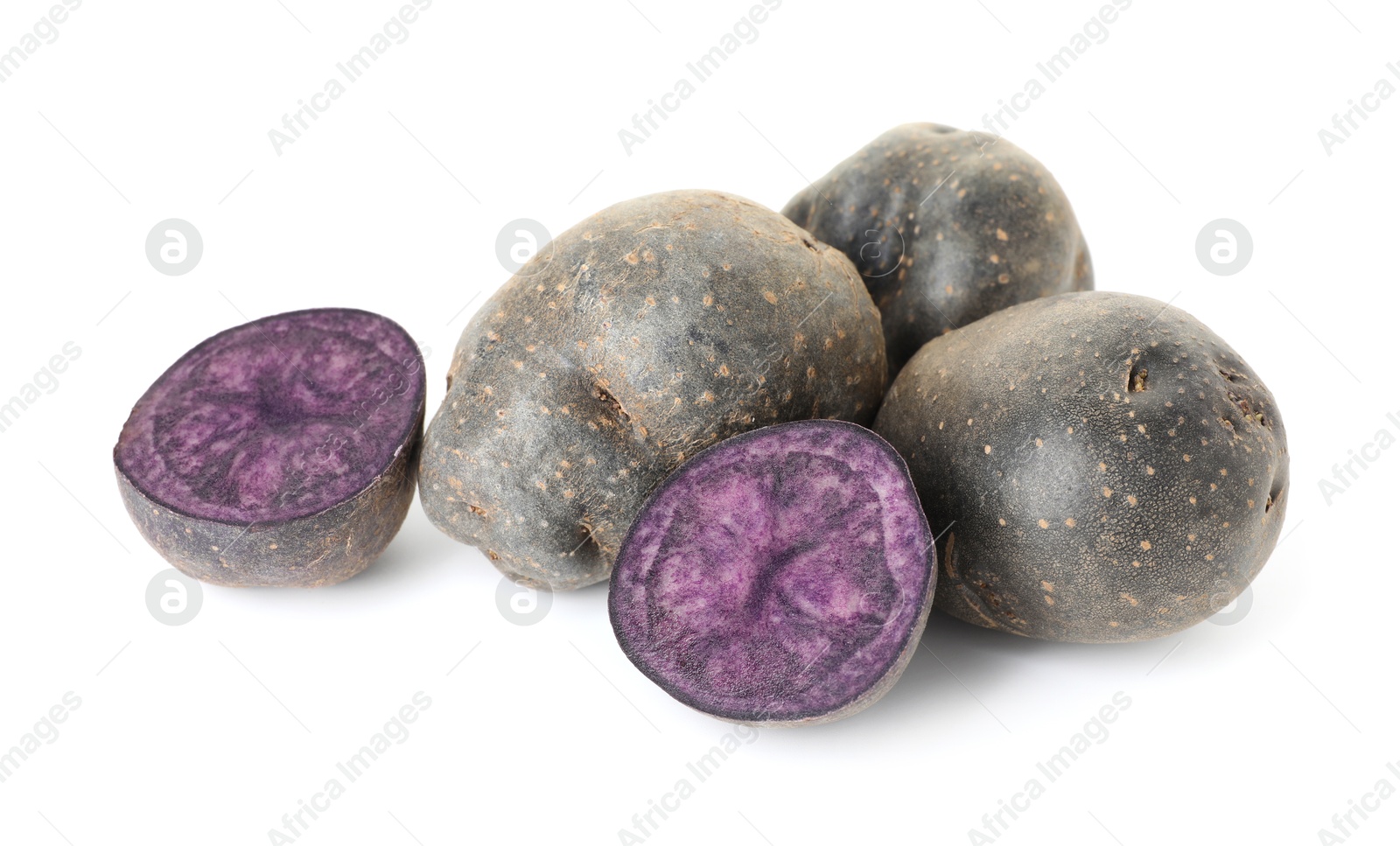 Photo of Fresh ripe purple potatoes isolated on white